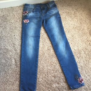Light wash jeans with roses